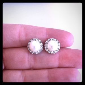 Faux diamond and pearl earrings.